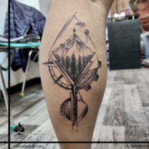 Traveller tattoo on legs - Ace Tattoos