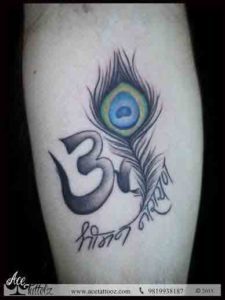 Om Feather Tattoos - ace tattoos