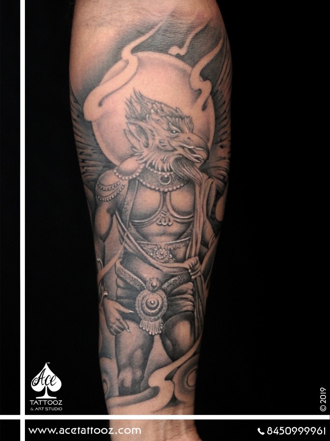 Tattoo uploaded by Tattoodo • Incredible back piece by Maneen #Maneen  #Hindu #Vishnu #Garuda #PhraRahu #deities #gods #arrows #clouds #wings  #darkness #scales #knife #bird #crown #snake #moon #star #ornamental  #pattern #blackandgrey #tattoooftheday •