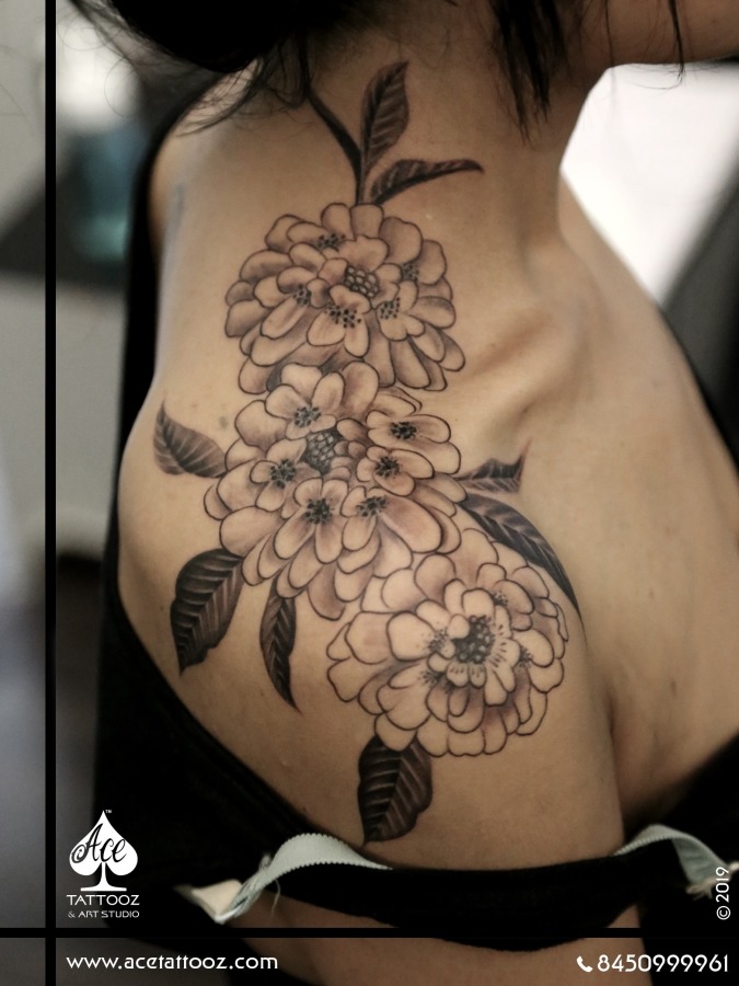 Classic Black And Grey Flowers Tattoo On Girl Right Back Shoulder