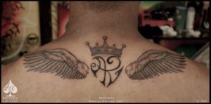 Crown and Wing Tattoo on Back