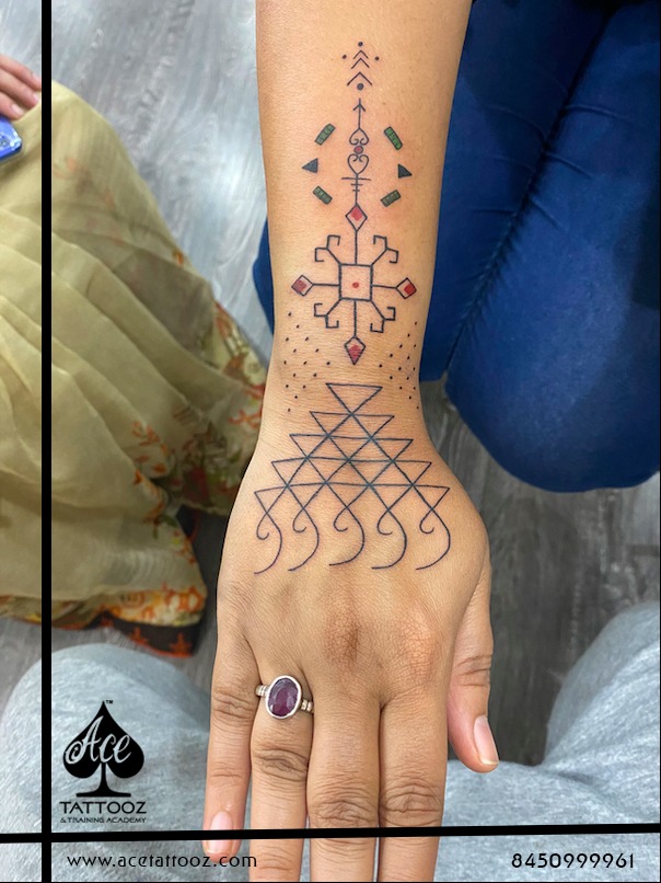 Customized Saraswati Symbol Tattoo