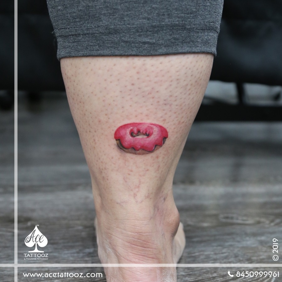 Black Ink Small Circle Tattoo On Leg – Truetattoos