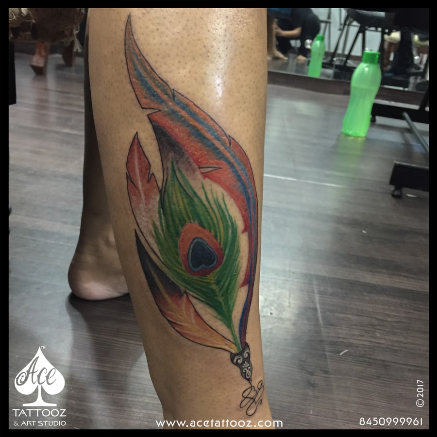 Colourful Peacock Feather Tattoo - Ace Tattooz