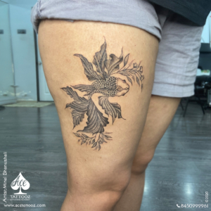 fish design tattoo legs - Ace Tattoos