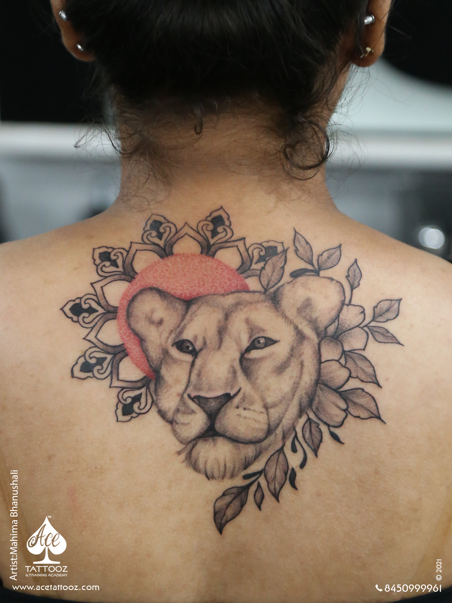 Floral Lioness Tattoo on Back - Ace Tattooz
