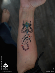 trishul om tattoo designs - God Tattoo Designs