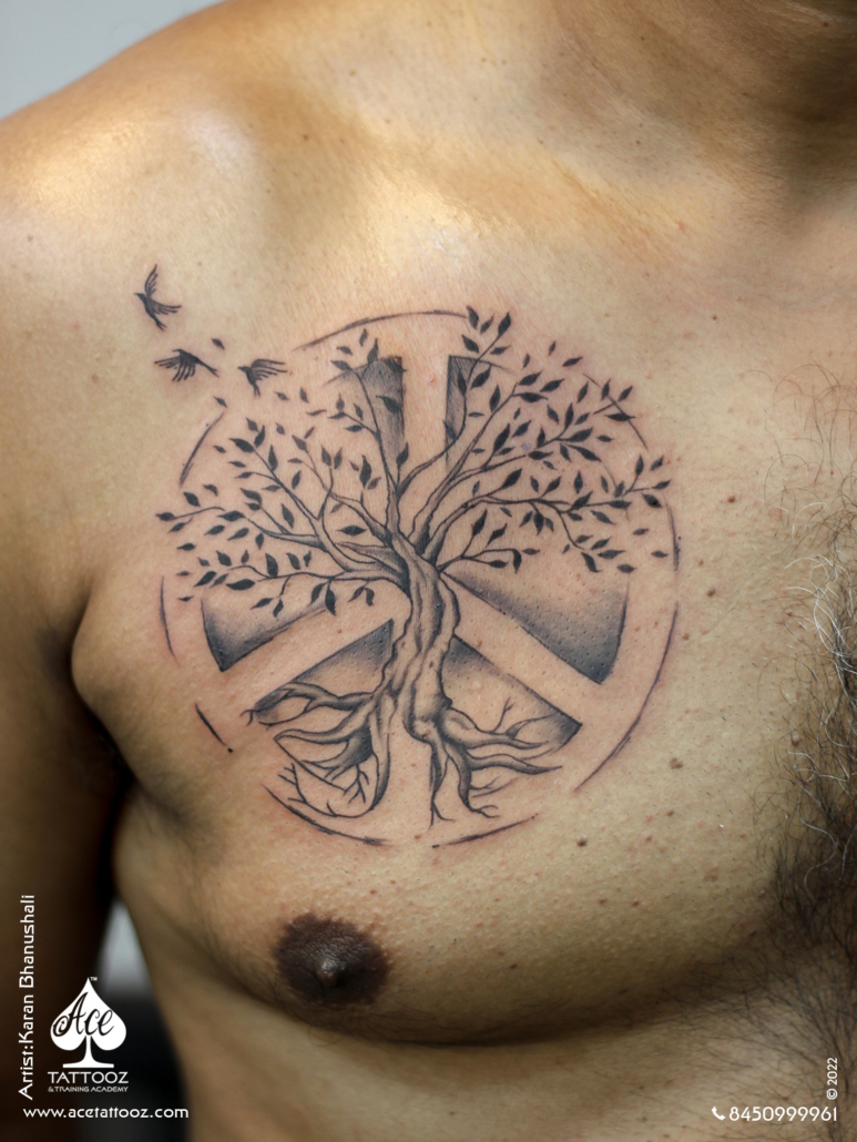 Tree and peace symbol tattoo