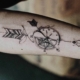 arrow tattoo on hand - ace tattooz