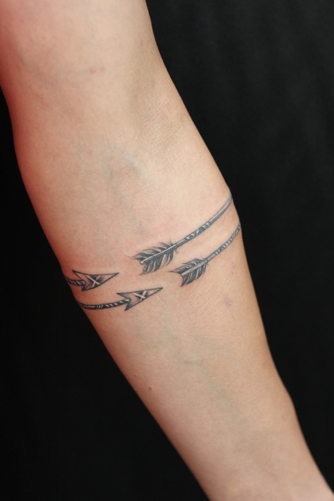 Japanese-inspired fish armband tattoo on Craiyon