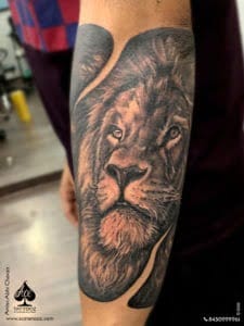 Black & White Realistic Lion Tattoo