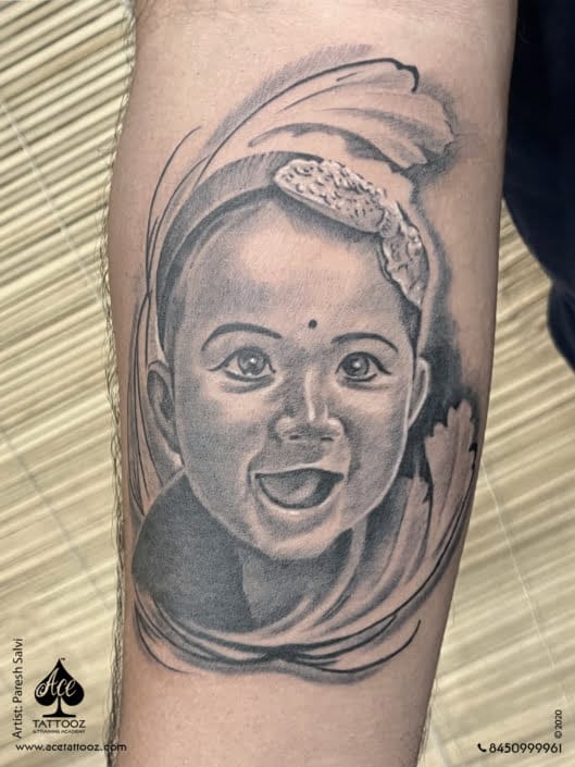 Black-and-White-Baby-Portrait-Tattoo-529×705