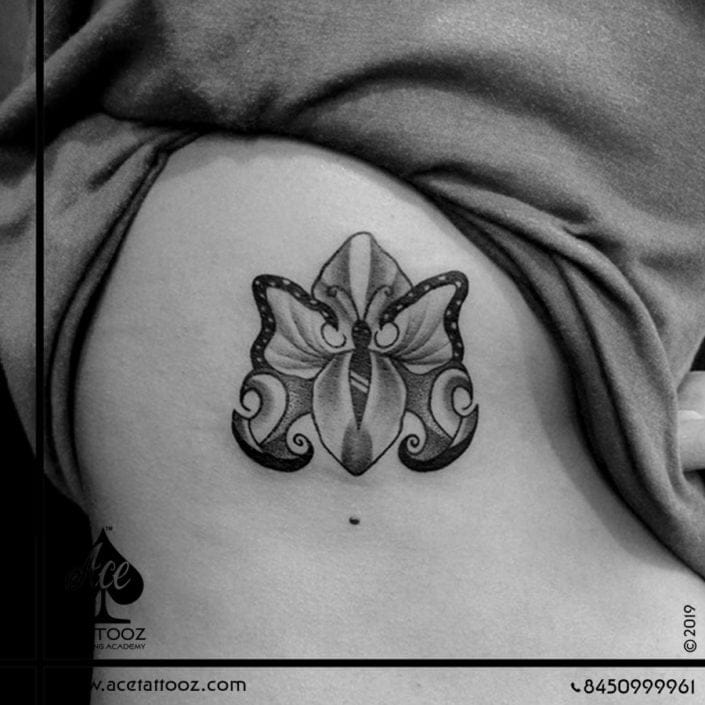 Butterfly-on-a-Flower-Black-and-Grey-Tattoo-Designs-705×705