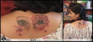Flower and Eye Tattoo on Back