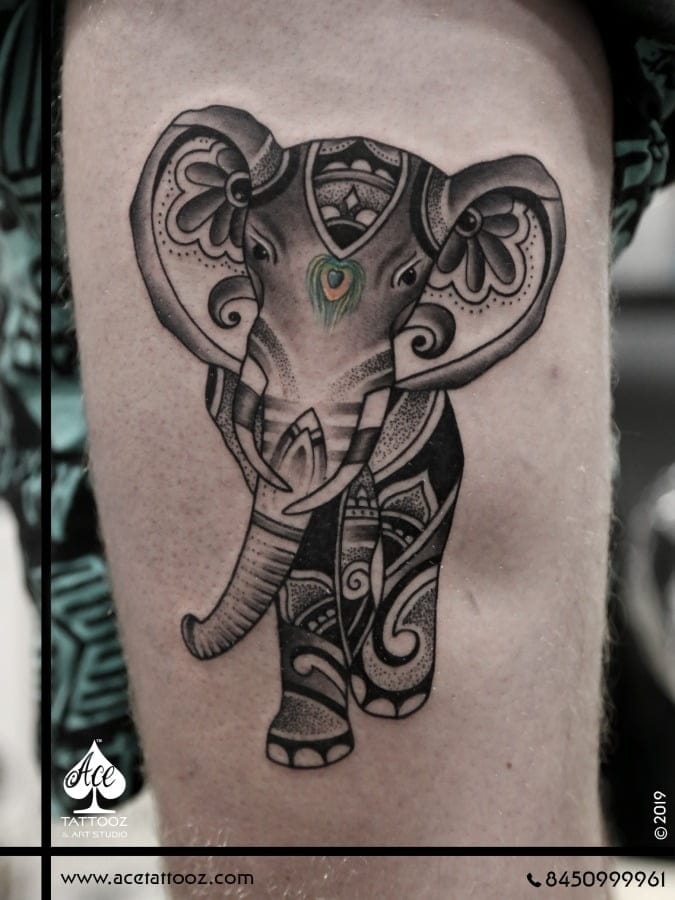 Happy-Go-Lucky-Unique-Elephant-Tattoo-Designs-For-Men