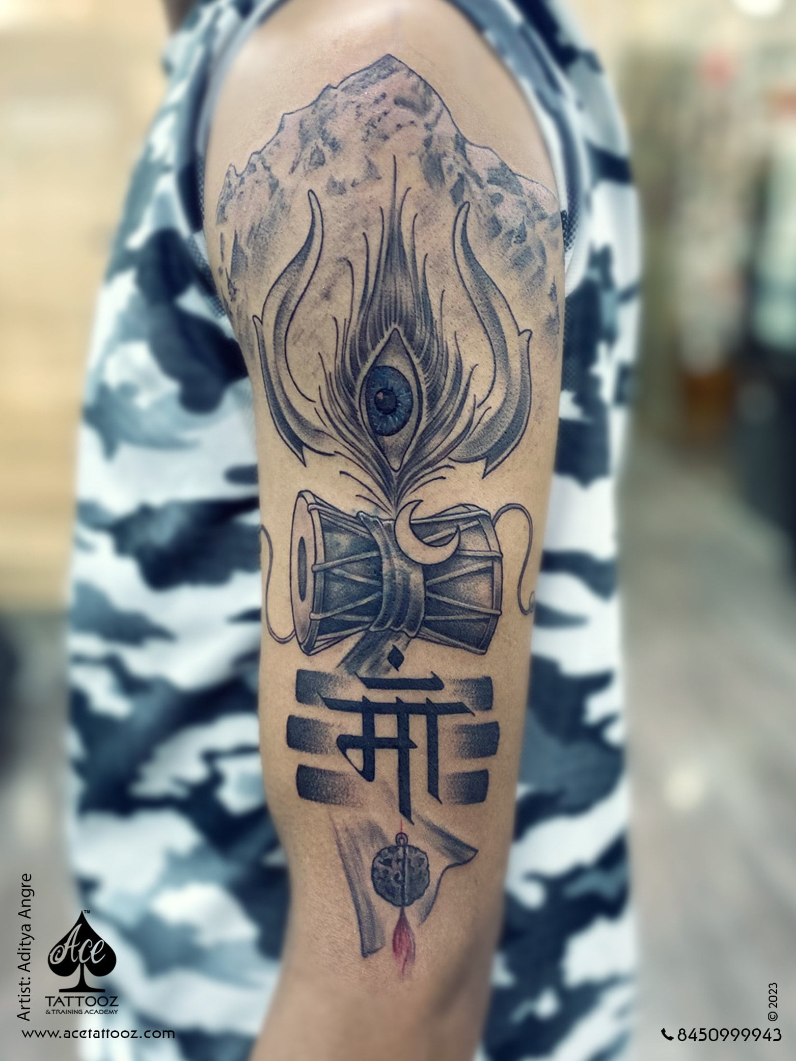 Embracing the divine energy with this stunning Shiva tattoo! 🌟 Featuring rudraksh, trishul, third eye with peacock feather, parvat, and a touch of maa magic!