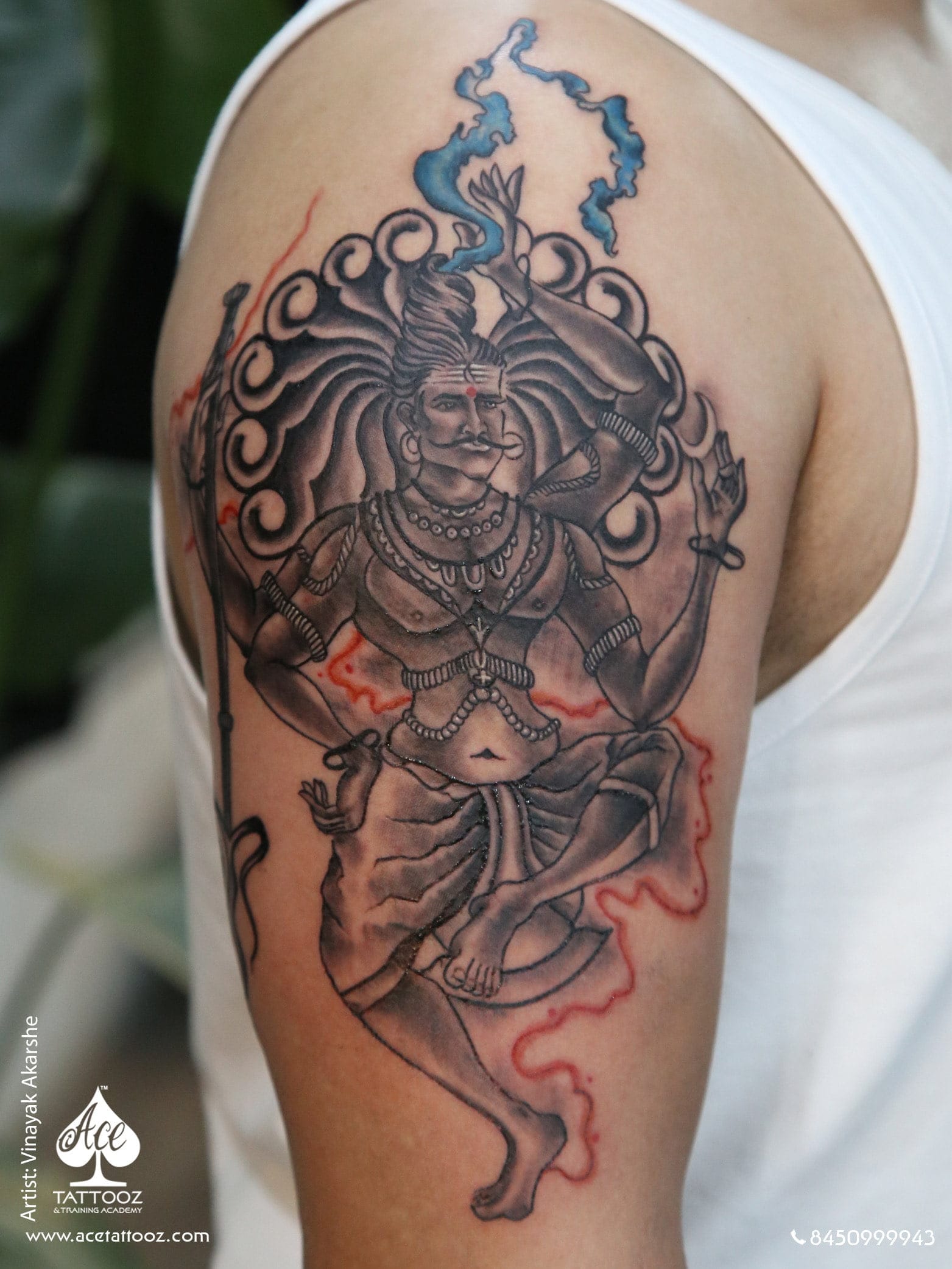 Embrace the invincible power of Lord Shiva with this vibrant and awe-inspiring color tattoo.