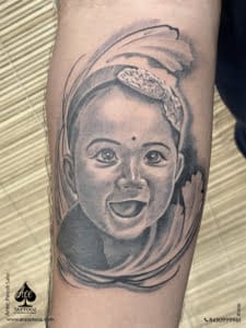 Realistic Baby Portrait Tattoo