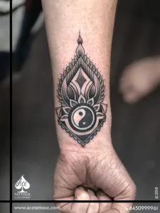 <div class="comment more">Chinese yin-yang symbols represent perfect balance. A great deal of Chinese philosophy. The yin-yang being the coolest metaphor for existence. The Positive & the negative in balance and added a lotus which is a sign of purity to have a positive balance of life.</div>