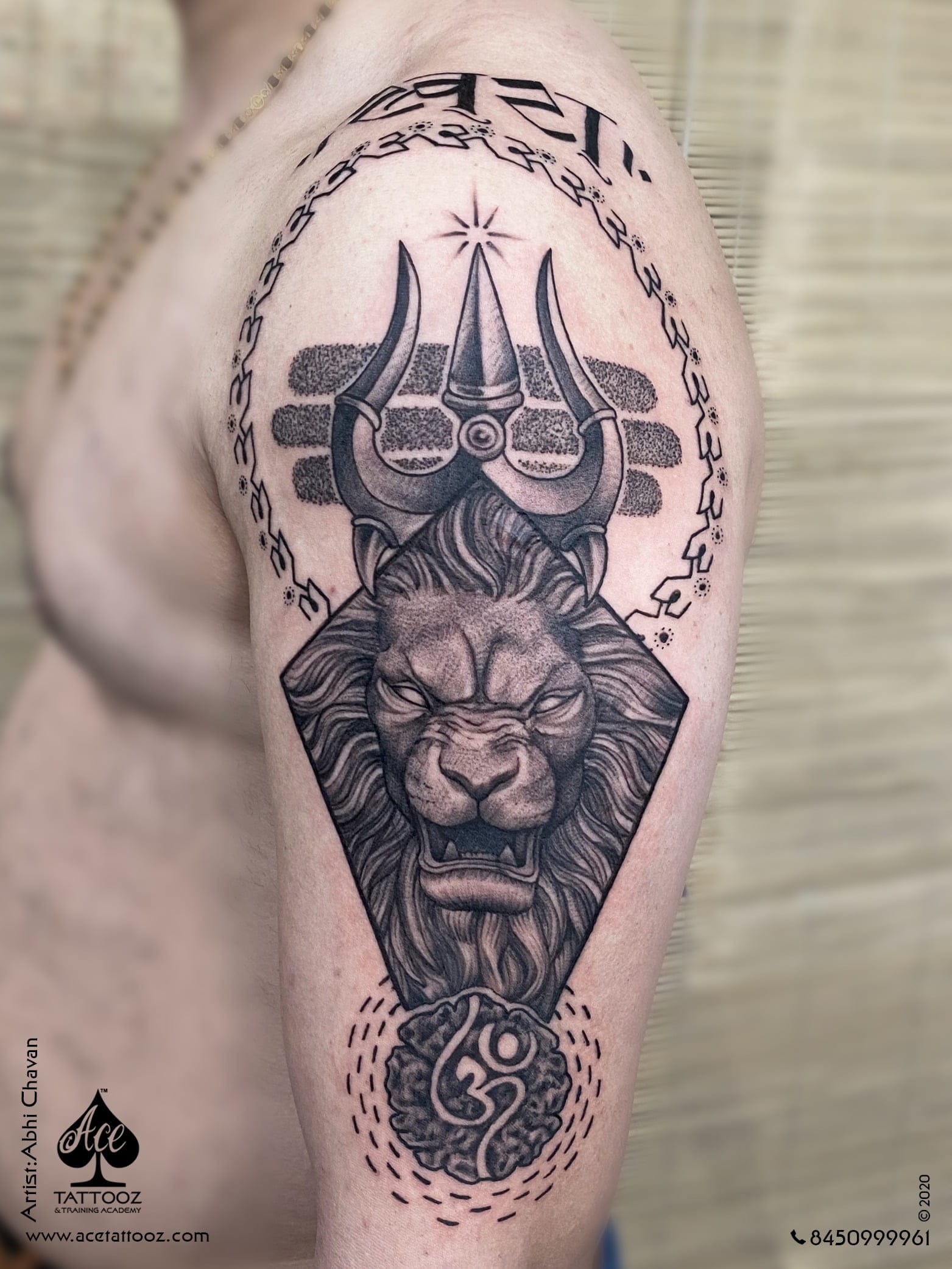 Lion and Trishul tattoo