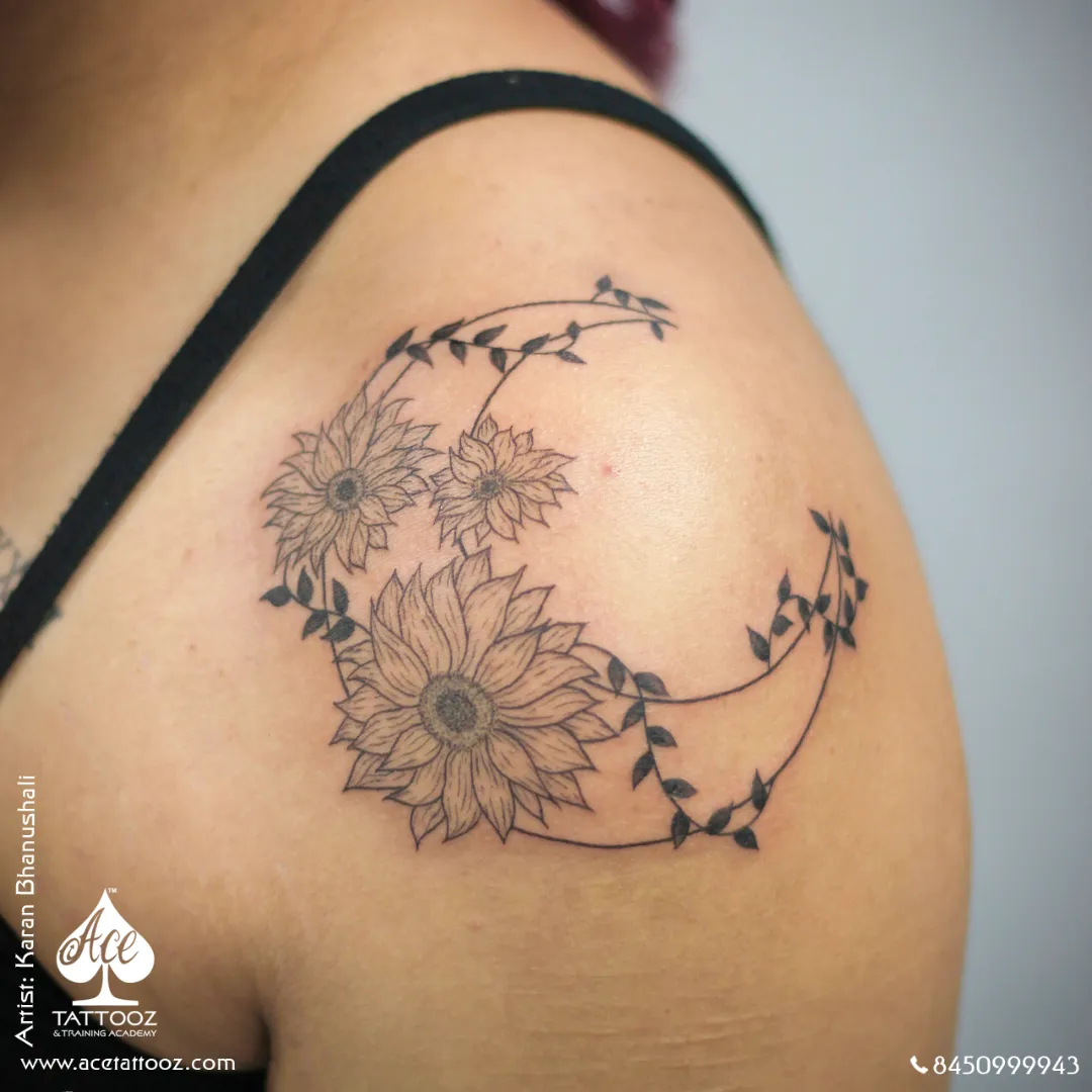 fine line sunflower moon tattoo on shoulder by karan bhanushali – ace tattooz