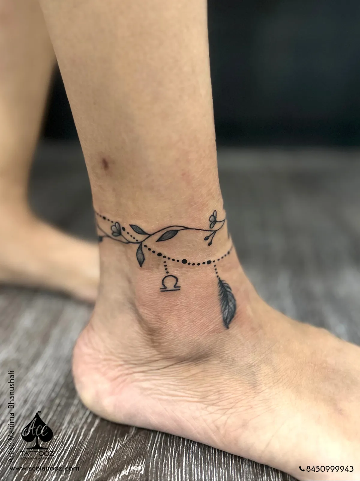 floral ankle tattoo with libra symbol fine line ace tattooz