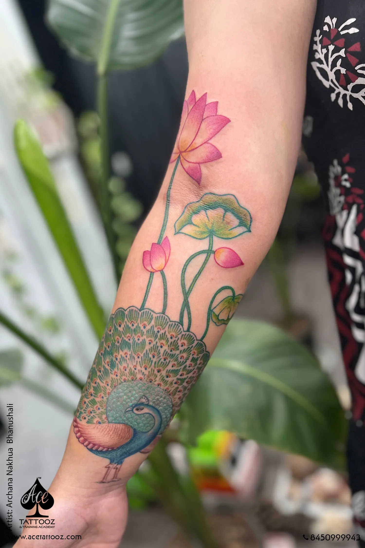 peacock and lotus floral tattoo on forearm by archana bhanushali – ace tattooz mumbai