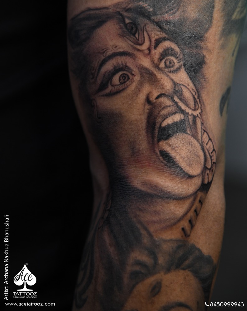 Fine-line Vakratunda Ganesha tattoo on a hand