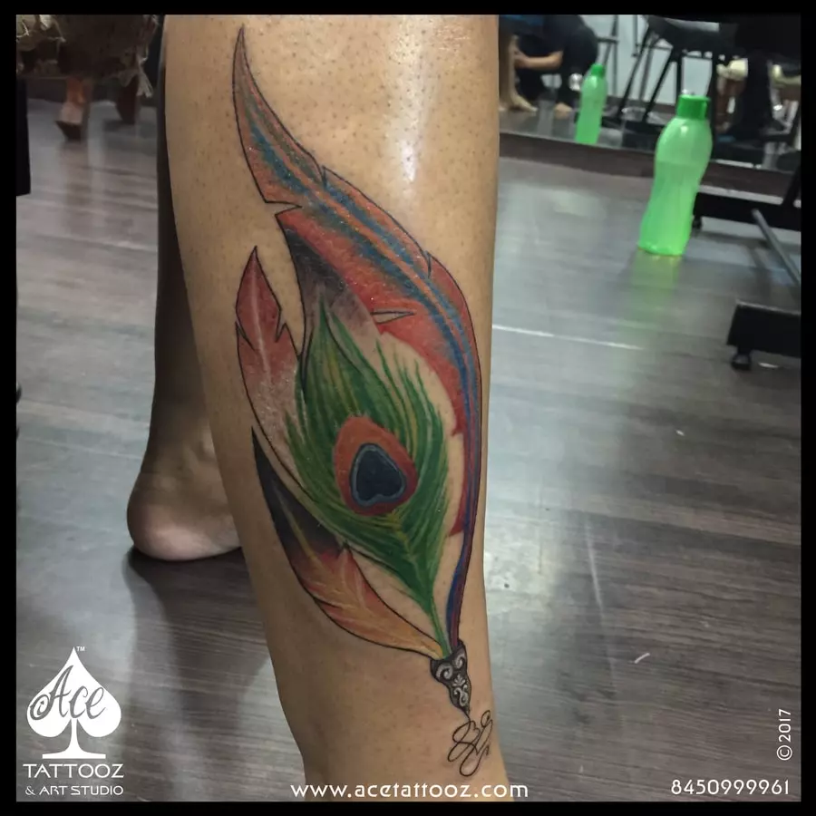 Beautiful peacock feather tattoo ideas and their meaning