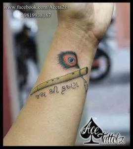 Krishna Flute tattoo designs - Ace Tattoos