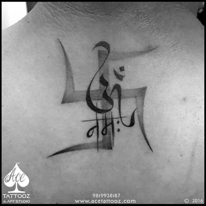 Om and swastik tattoo