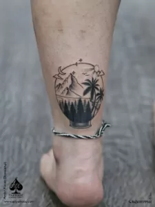 nature leg tattoo - Ace Tattoos