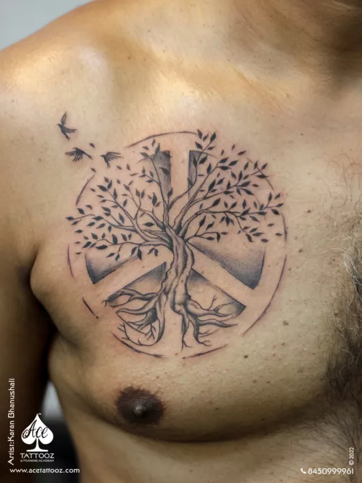 Tree and peace symbol tattoo